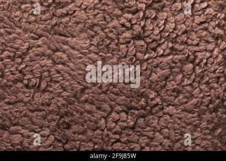 Texture of brown plush made of cotton. Stock Photo