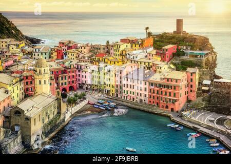 Vernazza village on a rock in Mediterranean sea, Cinque Terre, Liguria coast, Italy Stock Photo