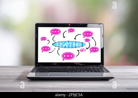 Chatting concept shown on a laptop screen Stock Photo