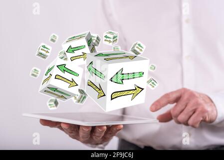 Decision concept above a tablet held by a man in background Stock Photo