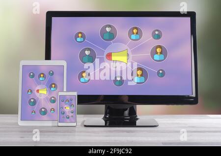 Network communication concept shown on different information technology devices Stock Photo