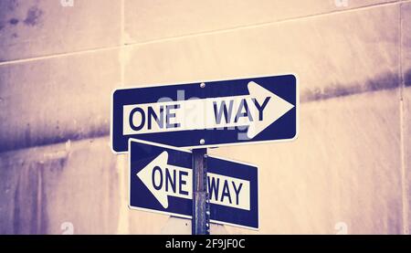 One Way road signs, selective focus, color toning applied
