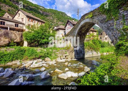 Historical stone bridge in Giornico village is one of the most famous roman  landmarks in Ticino canton, Switzerland Stock Photo