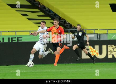 Non Exclusive: KYIV, UKRAINE - APRIL 17, 2021 - Defender Valeriy Bondar (R) of FC Shakhtar Donetsk and forward Artem Besedin of FC Dynamo Kyiv are see Stock Photo