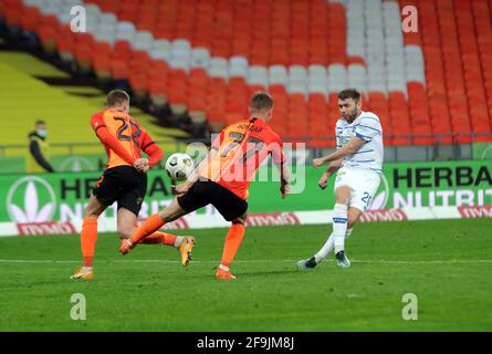 KYIV, UKRAINE - APRIL 17, 2021 - Defender Oleksandr Karavaev (R) of FC Dynamo Kyiv is seen in action with defenders Mykola Matviyenko (L) and Valeriy Stock Photo