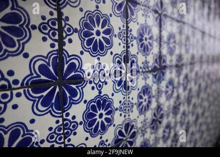 Closeup of a blue and white Mediterranean pattern tile wall at a luxury resort Stock Photo