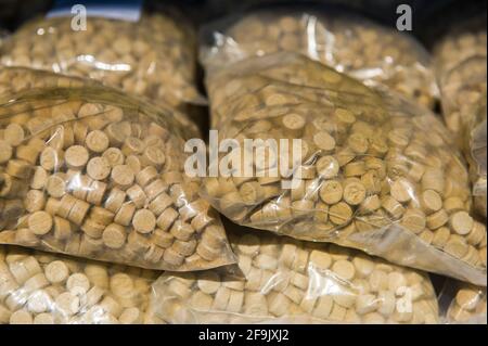 Military personnel seen guarding the evidence of methamphetamine and ecstasy as evidence of a case of drug trafficking at the Belawan Lantamal I Command Headquarters in North Sumatra, Indonesia on April 19, 2021. The Indonesian national navy has successfully arrested two smugglers of more than 100 kilogerams of amphetamine (crystal methamphetamine and ecstasy) drugs that are suspected of being carried from Malaysia - China in the waters of the Asahan River, North Sumatra, Indonesia on April 18, 2021. The disclosure was an intelligence collaboration and routine patrols, said the Commander of Ko Stock Photo