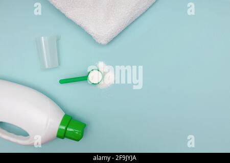 https://l450v.alamy.com/450v/2f9jyja/washing-liquid-powder-detergent-and-clean-white-towel-2f9jyja.jpg