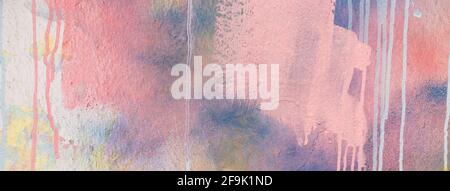 Pink, blue, white painter plastered wall background with colorful drips, flows, streaks of paint and paint sprays Stock Photo