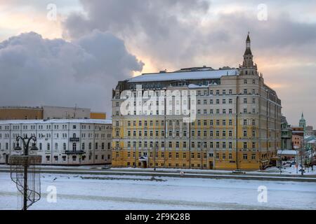 Moscow, Russia - January 17, 2021: View of the Balchug Kempinski Hotel on Balchug Street and Raushskaya Embankment in Moscow, near Kreml embankment on Stock Photo