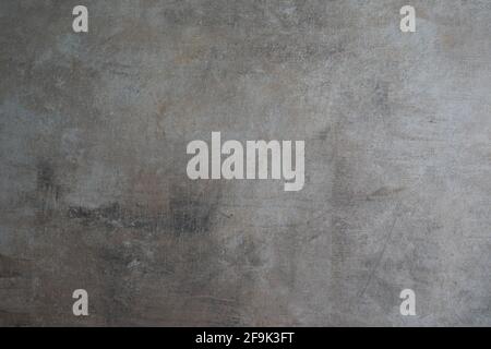 scratched and damaged smooth concrete background texture wall Stock Photo