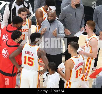 Atlanta, USA. 18th Apr, 2021. Atlanta Hawks head coach Nate McMillan coaches up his players during a time out in a 129-117 victory over the Indiana Pacers on Sunday, April 18, 2021, at State Farm Arena in Atlanta, Georgia. (Photo by Curtis Compton/Atlanta Journal-Constitution/TNS/Sipa USA) Credit: Sipa USA/Alamy Live News Stock Photo