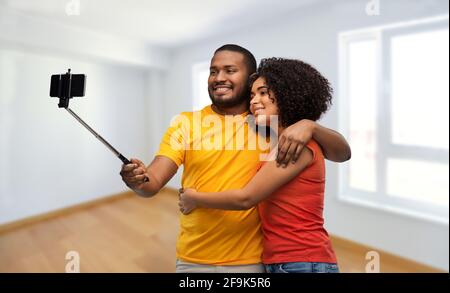 african american couple taking selfie by cellphone Stock Photo