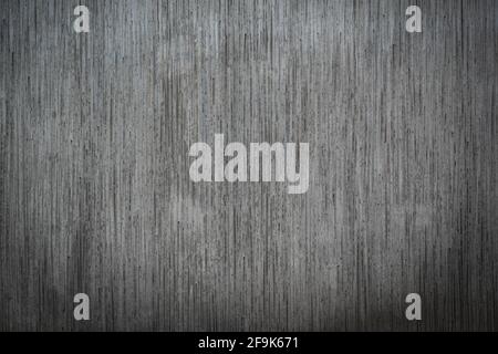 vertical striped dark gray cooncrete facade background texture with copy space Stock Photo
