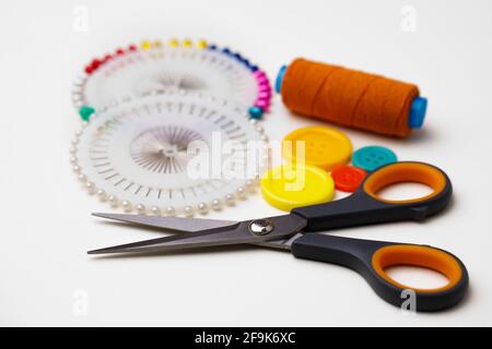 Various sewing accessories isolated on white background Stock Photo