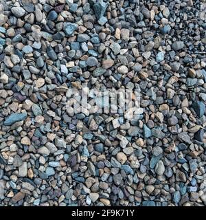 Crushed gravel texture, gravel on the ground. Texture of little rocks Stock Photo