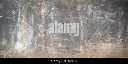 old cracked wall background texture with paint peeling off and copy space Stock Photo