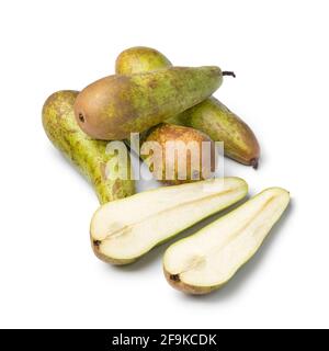 Heap of fresh whole and halved long shaped juicy Abate Fetel pears isolated on white background Stock Photo