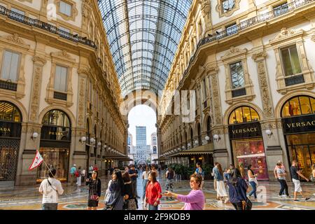 MILAN, ITALY - JUNE 23, 2019: Crowd of tourists at Galleria Vittorio Emanuele II, center of Milan city Stock Photo