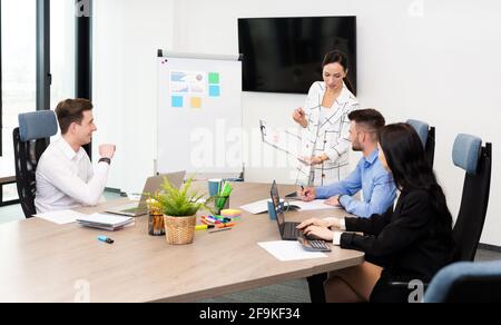 Business people working together. Team listening the leader on business meeting Stock Photo