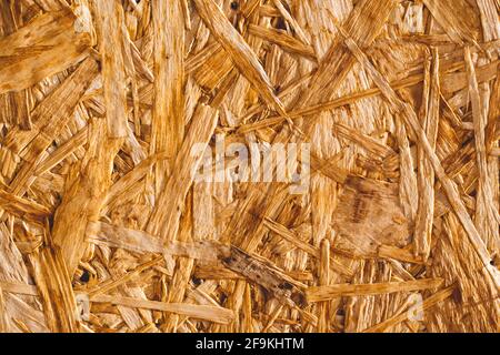 Background texture. Surface of the OSB wood board. Top view, copy space Stock Photo