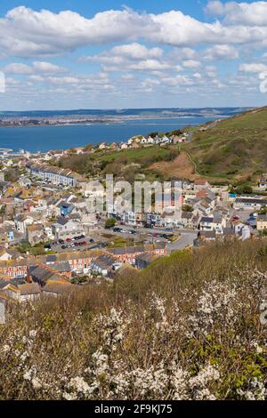 Looking down over Chiswell, Fortuneswell, Isle of Portland from Portland Heights, Portland, Weymouth Dorset, UK in April Stock Photo