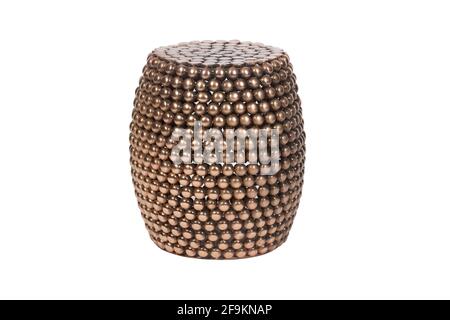 Bronze metal drum side table or stool isolated on white background Stock Photo