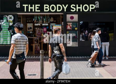 Hong Kong, China. 19th Apr, 2021. Pedestrians walk past the British cosmetics, skin care and perfume company, The Body Shop seen in Hong Kong. (Photo by Budrul Chukrut/SOPA Images/Sipa USA) Credit: Sipa USA/Alamy Live News Stock Photo