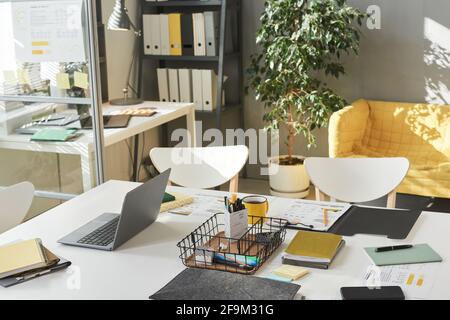 Image of table with computer and documents and other office supplies at modern office Stock Photo