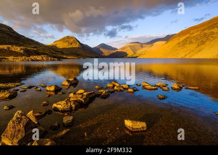 Wastwater in the English Lake District during the golden hour, shortly before sunset. Stock Photo