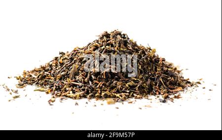 pile of loose green tea - dry green tea leaf isolated on white background Stock Photo