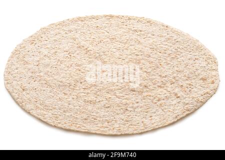 Single plain spelt and oat tortilla wrap isolated on white. Stock Photo