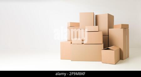 stack of cardboard boxes on white background Stock Photo