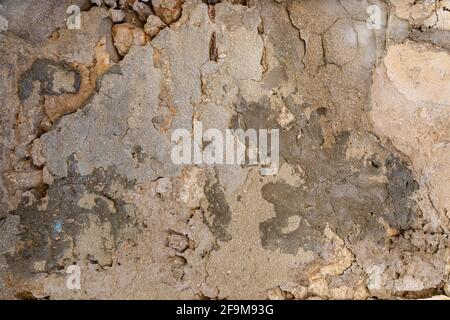 Abstract background of clay brown wall with spots of gray cement Stock Photo