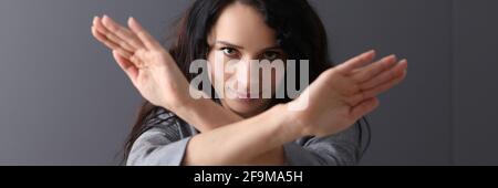 Business woman folding her arms in front of her Stock Photo