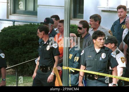 Oklahoma City, OK, USA. 17th Apr, 2001. Alleged Oklahoma city bomber TIMOTHY MCVEIGH, 27, is led by law enforcement out of the Noble County Courthouse in Perry, Oklahoma on April 21, 1995 following his arrest in the bombing of the Murrah Federal Building two days earlier. McVeigh was put to death on June 11, 2001 after being convicted of the crime. Credit: Bob Daemmrich/ZUMA Wire/Alamy Live News Stock Photo