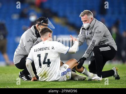 Leeds United's Diego Llorente receives treatment after the final whistle during the Premier League match at Elland Road, Leeds. Picture date: Monday April 19, 2021. Stock Photo