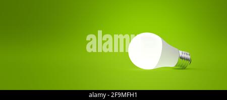 LED light bulb isolated on green background. Bright light. Light-emitting diodes. Energy-efficient. Ecological concept. 3d illustrator. Stock Photo