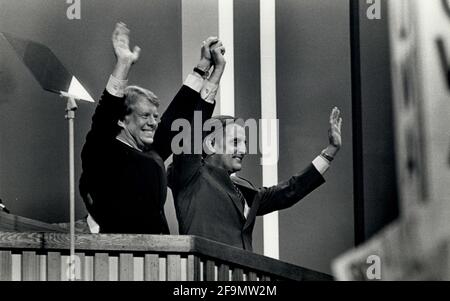 New York, New York, USA. 07th July, 1976. Presidential candidate JIMMY CARTER, left, and his VP choice WALTER MONDALE raise their arms in unison at the National Democratic Party Convention NYC in Madison Square Garden. Credit: Keystone Press Agency/ZUMA Wire/Alamy Live News Stock Photo