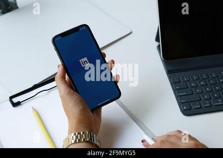CHIANG MAI, THAILAND: APR 17, 2021 : LinkedIn logo on phone screen. LinkedIn is a social network for search and establishment of business contacts. It Stock Photo