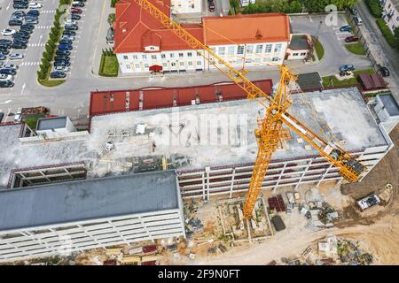 aerial view of construction site of multilevel parking garage in residential area Stock Photo