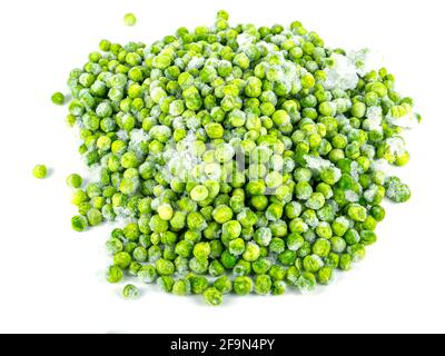 Frozen green peas vegetable on a white plate. Stock Photo