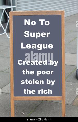No to super league football, created by the poor stolen by the rich text on a chalk board. Football fans message concept Stock Photo