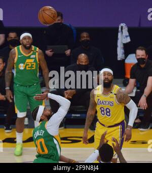 Los Angeles, Unites States. 20th Apr, 2021. Utah Jazz guard Mike Conley scores over Los Angeles Lakers' defenders during the second half of their NBA game at Staples Center in Los Angeles on Monday, April 19, 2021. The Jazz defeated the Lakers 111-97. Photo by Jim Ruymen/UPI Credit: UPI/Alamy Live News Stock Photo