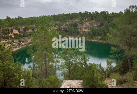 Views of the Gypsy Lagoon, a karstic lake located in the Natural Monument of Cañada del Hoyo Lagoons, province of Cuenca, Spain Stock Photo