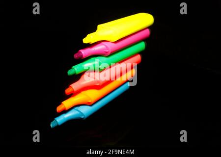 a stack of six marker pen isolated on black Stock Photo