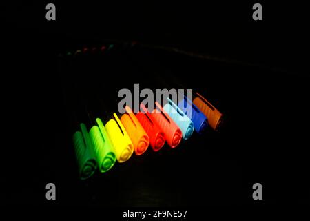Multicolor Inline fineliner covers isolated on black Stock Photo