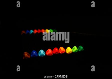Inline neon multicolor fineliners isolated on black Stock Photo