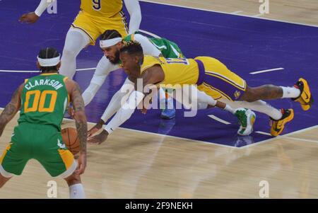 Los Angeles, Unites States. 20th Apr, 2021. Utah Jazz guard Mike Conley (10) and Los Angeles Lakers' guard Dennis Schroder (17) dive for the loose ball during the first half of their NBA game at Staples Center in Los Angeles on Monday, April 19, 2021. The Jazz defeated the Lakers 111-97. Photo by Jim Ruymen/UPI Credit: UPI/Alamy Live News Stock Photo