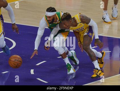 Los Angeles, Unites States. 20th Apr, 2021. Utah Jazz guard Mike Conley (10) and Los Angeles Lakers' guard Dennis Schroder (17) chase the loose ball during the first half of their NBA game at Staples Center in Los Angeles on Monday, April 19, 2021. The Jazz defeated the Lakers 111-97. Photo by Jim Ruymen/UPI Credit: UPI/Alamy Live News Stock Photo